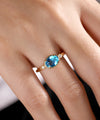 14K Yellow Gold Oval Swiss Blue Topaz and Diamond Three Stone Ring