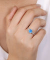 14K White Gold Round Bezel Set Blue Topaz and Diamond Ring